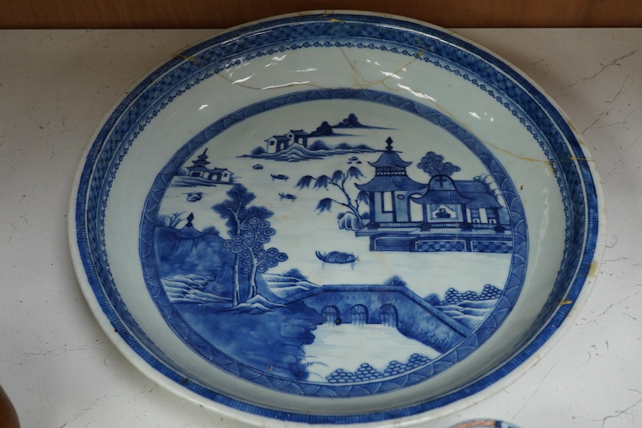 A collection of 18th century and later Chinese porcelain to include tea bowls and saucers and a large dish (a.f), largest 33cm in diameter